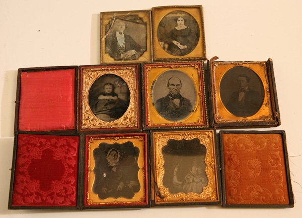 SEVEN CASED IMAGES: Including two early sixth plate daguerreotype portraits husband and wife (husband cover glass cracked); 3 ambrotype portraits including a cute soft focus tinted portrait of a 1-2 year old girl in dark