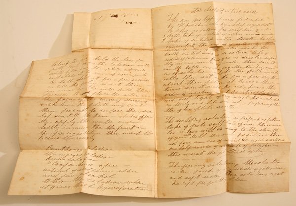 1857 MS LETTER ON AMBROTYPE PROCESS: A single folded lined letter sheet with two pages of inked text, docketed on reverse with “A prescription of the Ambrotype process given by Flearman Boucher 1857” The description begins: “Coting