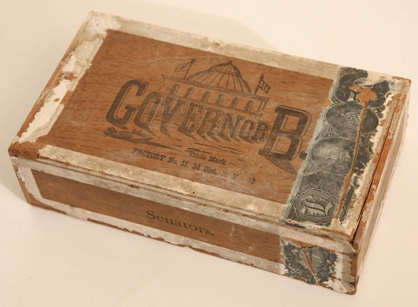 OHIO GOV. R.M. BISHOP CIGAR BOX: A wooden cigar box (5 x 8.5 x 2.5” high) of brand name cigar of “Governor B.” with interior portrait label of the 34th Governor of Ohio Richard Moore Bishop (1812-1893) was born in Fleming Co., 