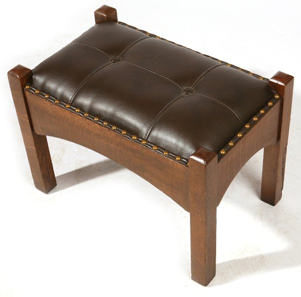 STICKLEY BROS. ATTRIBUTION FOOTSTOOL: With arched sides. Original medium brown finish. 15" high x 21" long x 13 1/2" wide.