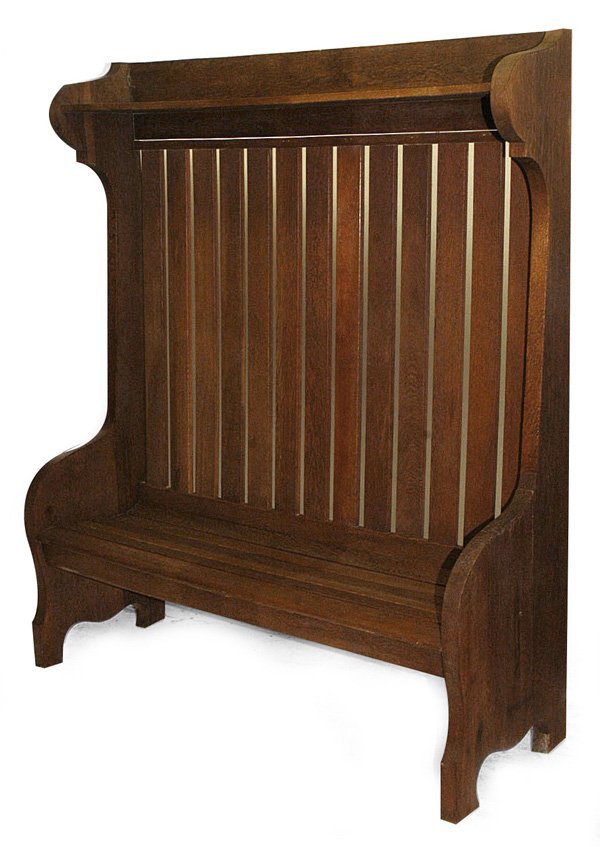 MASSIVE HALL BENCH IN STYLE OF GUSTAV STICKLEY: With slat back and seat with upper shelf and scrolled sides. Refinished. 71" high x 58" wide x 20" deep.