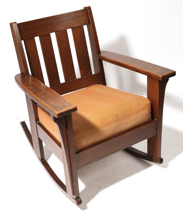 LIMBERT ROCKER: With long corbels and four slat back. Excellent original finish. Branded. 28 1/2" x 31" x 34" high.