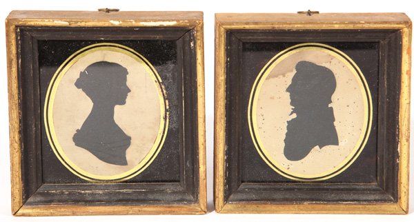 . Cut-Out Silhouettes: Likely a young married couple with lady facing right, and gentleman facing left. 3.5" x 4.5”, in matching period gilt frames with reverse painted cover glasses, 4.5" x 5.25”.