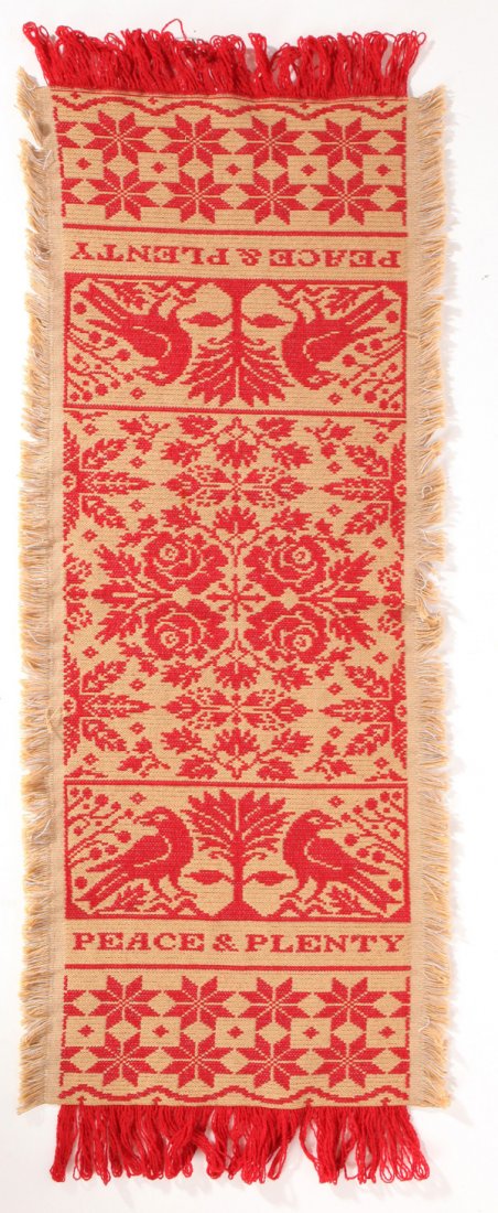 Jacquard Woven Show Towel: In red on linen ground with roses in center, flanked by a tree, flanked by two birds, flanked by “Pease & Plenty” and with stared ends. 14" x 42”.