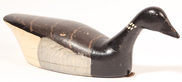 Charles Parker Brant Goose Decoy: Circa 1915, Tuckers Island, N.J., in original working paint, nice graceful form hollow body decoy, 18.5” long x 5.25" x 6.75” high. See page 94, Plate 186 New Jersey Decoys, by Fleckenstein.