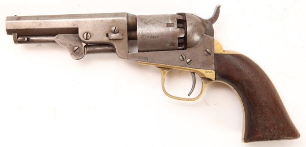Colt 1849 Pocket Revolver: 31 caliber percussion, marked on top of octagonal barrel, “Address Col Saml Colt New York U.S. America” with stage coach scene on cylinder, original walnut grips, all matching serial numbers “23