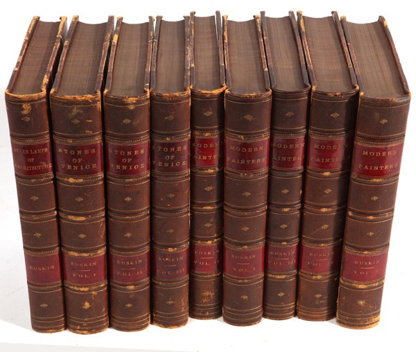 John Ruskin’s Books: Including five volume set of Modern Painters, three volume set of Stones of Venice, and The Seven Lamps of Architecture, all beautifully bound volumes in matching ½ brown leather with marbled boards