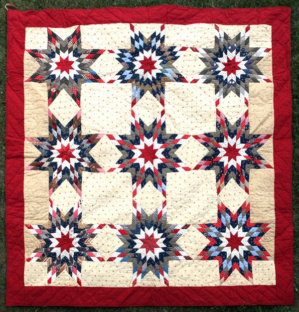 Early Pieced Star Quilt: With nine 8-pointed stars on a calico print field with calico backing, made with solid, print and calico print patterned cotton, all hand quilted with red calico print border, 79 x 80â€.