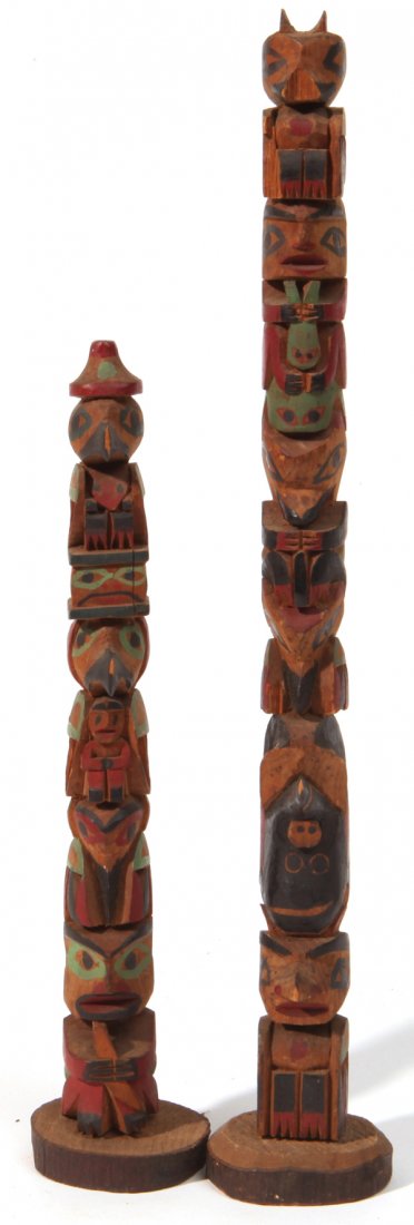Two Carved & Painted Totem Poles: Both Northwest Coast Native carved one with six figures, 11.65â€ high, and smaller with 4 figures, 8.5â€ high, with original printed paper label on reverse reading â€œFrom/Ye Olde Curiosity/