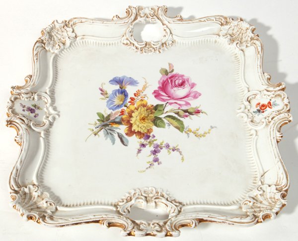 Meissen Porcelain Tray: Beautiful hand painted flowers in center of a molded square tray with open handles and shells at corners, blue crossed sword underglaze mark and impressed numbers â€œ135 Z82â€, with gilt highli