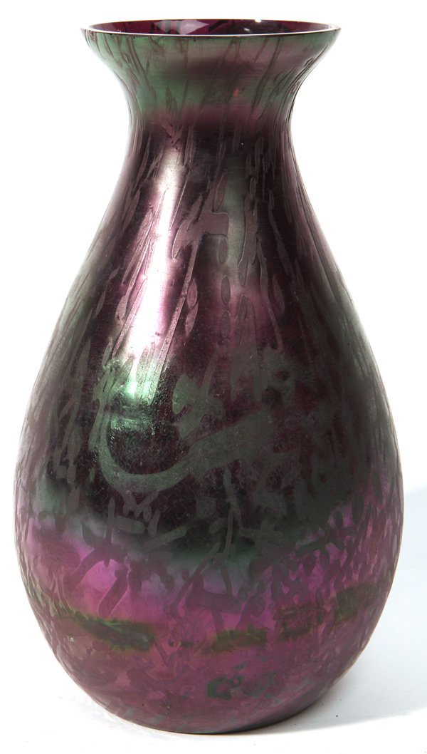 Loetz Type Art Glass Vase: Baluster form in purple iridescent with vining stylized floral, 10.4â€ high.