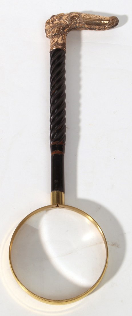 Gilt Magnifying Glass: With ebonized spiral turned wood handle with gold filled chased and bright cut crook type handle, 11.75â€ long.