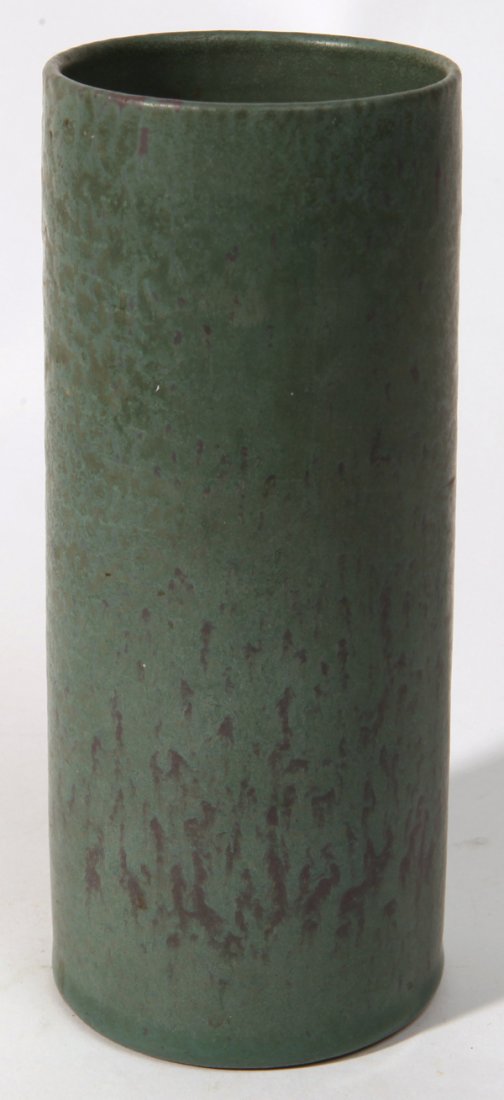 Marblehead Pottery Cylinder Vase: In mottled green matt glaze with two oval printed labels, both with â€œMarblehead/Potteryâ€ and one with inked inscription reading â€œSpecialâ€, 7.25â€ high.