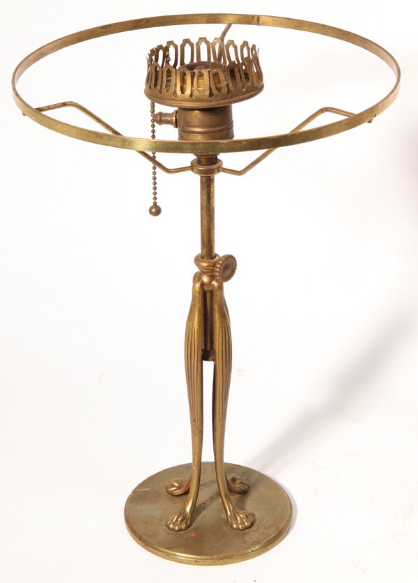 L.C. Tiffany Lamp Base: Bronze lamp base in the from of three animal legs with telescoping top. Marked "Tiffany Studios/New York/427" on base. Extends from 12" to 16" high.