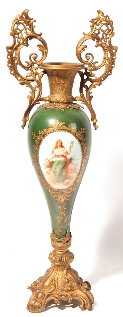 Victorian Glass Ormolu Urn: With reverse baluster form, painted in green with oval medallion portrait of young lady, likely one of the four seasons, summer, as she holds a basket of roses and blue bird in hand, with ornate ormal