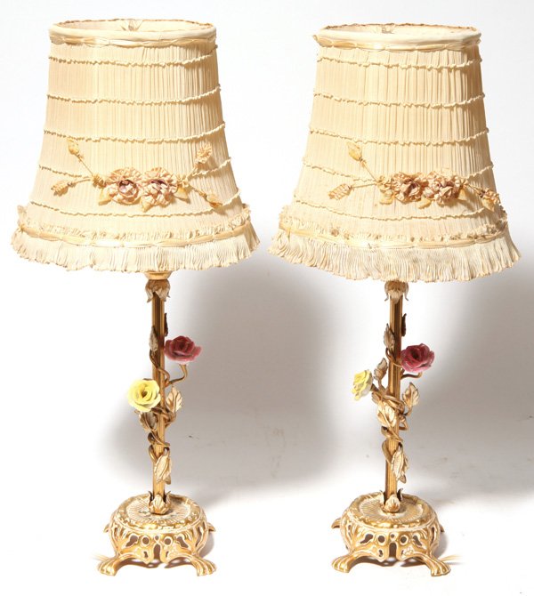 Pair of Edwardian Vanity Lamps: With double ribbed goose necks with brass vine and leaves wrapping around posts with yellow, rose and purple porcelain roses attached to the vines, mounted on an open work cast brass base in Art Nouve