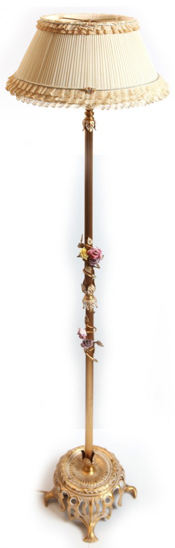 Edwardian Brass & Porcelain Floor Lamp: With double ribbed goose necks with brass vine and leaves wrapping around posts with yellow, rose and purple porcelain roses attached to the vines, mounted on an open work cast brass base in Art Nouve