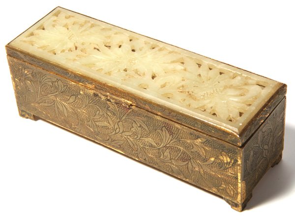 Chinese Lidded Jade Stamp Box: Early 20 th century with inset light green jade reticulated flower panel in lid on floral engraved brass base with short bracket feet. Interior with three compartments for stamps of different sizes. 4