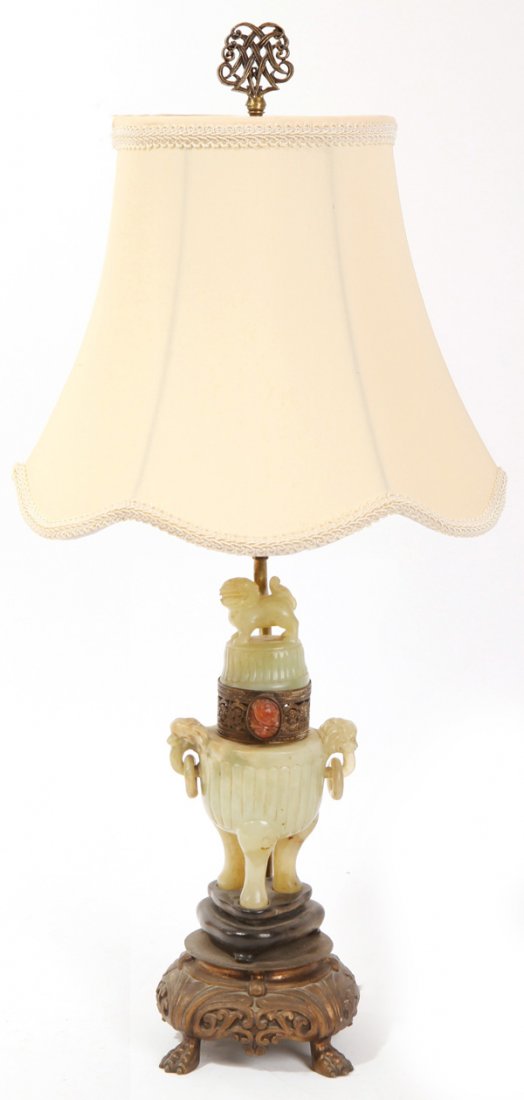 Chinese Jade Censor: Made into a lamp in the 1920's. This light green jade censor with ribbed body on three cabriole legs with food dog mask handles with free swinging rings and foo dog finial on lid, Censor is circa 6" h
