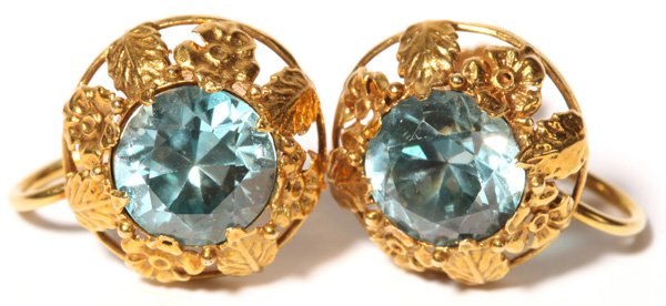 14K Gold Screw Back Earrings: Earrings have a deep aqua colored stone. They weigh 2.8 dwt. 1/2" dia. Setting