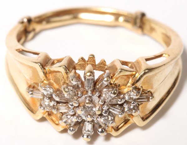 14K Gold-Diamond Ladies Ring: Has 12 Baguette diamonds, and 9 round diamonds. Approximaely 1/2 ct. t.w. Ring weighs 3.5 owt.