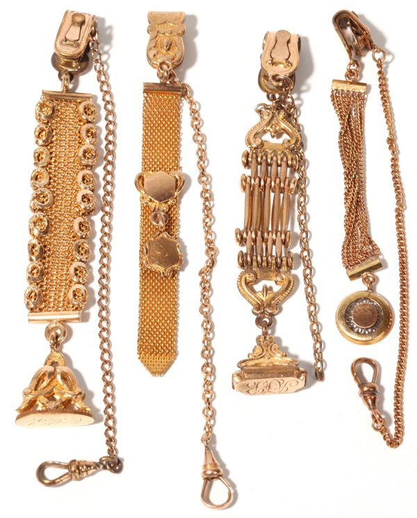 Watch Chains Gold Filled: Four small vest style watch chains with fobs.
