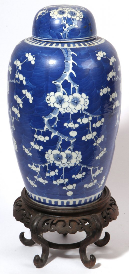 Chinese Porcelain Covered Jar: In blue and white painted porcelain, domed lid, with 4 character mark on base. 8" diameter x 16" high with very nice carved teak stand with cabriole legs, 5.5" high