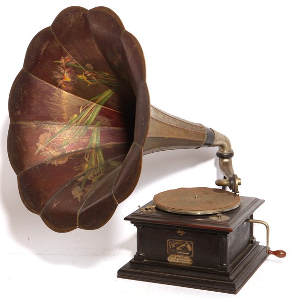 Original Victor IV Disc Phonograph: With large floral decorated morning glory horn, original Victor exhibition reproducer, mahogany case with original finish, original Victor tag, and Hamilton, Ohio retailer tag. 32" H x 30" W x 32 1/2"