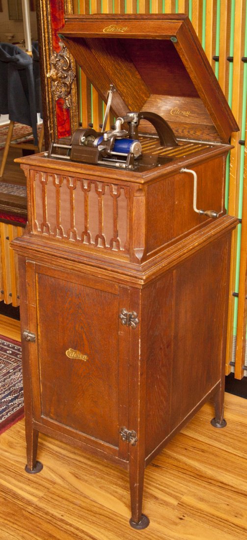 Edison Amberola Cylinder Phonograph: Edison Amberola Model V cylinder phonograph and cabinet. Oak case with front grill and inside horn with Edison decal. Sits on its original four drawer oak storage cabinet with original decal. A nice E