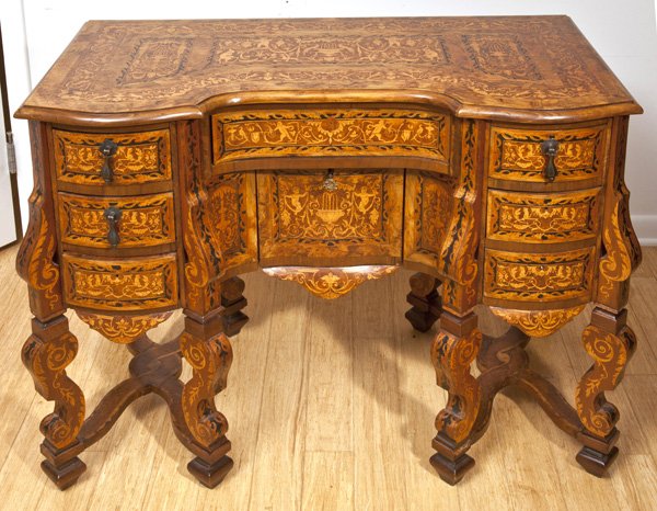 19th Century Marquetry Desk: In mahogany with inlaid satin wood and ebony, and burled panels with central well having 1 drawer over 1 door with inlaid cheribum, urns, monkeys, birds, dogs, squirrels, and vining scroll work, flank