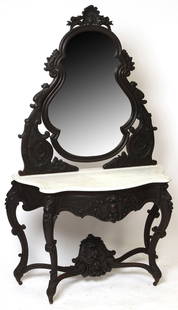 Rococo Marble Top Console Table with Mirror: Great walnut console table with carved mirror within two arms, each with carved animal heads, and other wonderful carvings. The arms dialed into a carved scalloped white marble top, resting on base wi