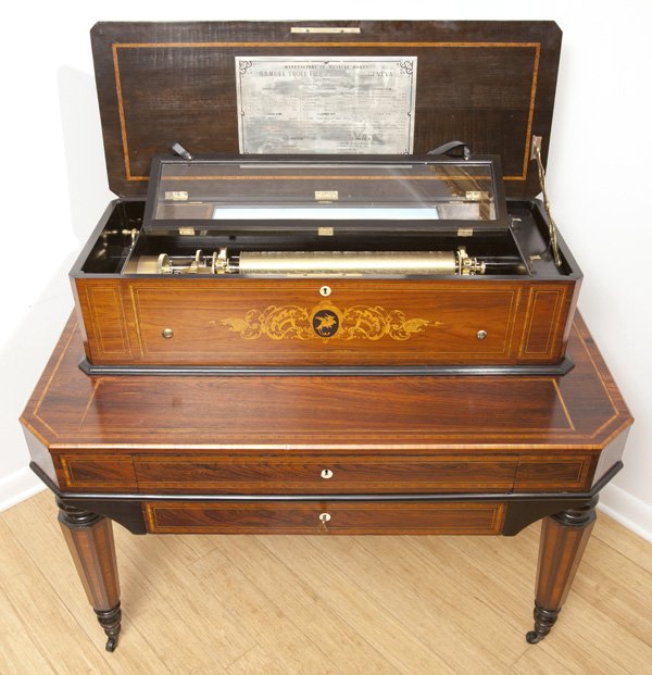 Samuel Troll Interchangable Cylinder Music Box &: With double comb, eight 18" long cylinders housed in two drawers in cabinet. Â The mahogany box has marquetry inlay on lid and front, with musical instruments, bird, and floral scrollwork with surro