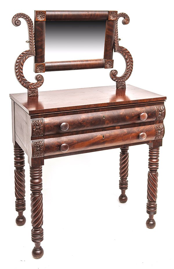 Federal Cherry Dressing Table: Circa 1840, Mid-Atlantic with ring and spiral turned legs, two ogee drawers with turned cherry knobs and mahogany crotch grain veneer, flanked by acanthus leaf carved posts, goose-neck mirror supports