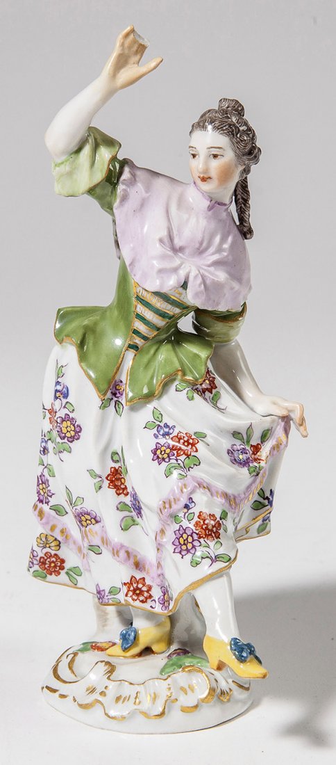 Meissen Figure: Dancing lady, with blue underglazed crossed sword mark and both incised and impressed marks, 6" high.
