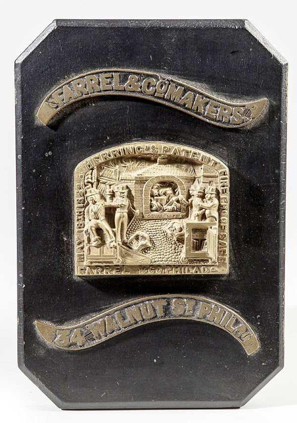 Rare Plaque from Philadelphia Safe Maker: Three piece bronze on wood mount with bronze ribbon banners at top and bottom reading "Farrel & Co. Makers" and "34 Walnut St. Phila." Central high relif bronze plaque has Victorian workers in op hats