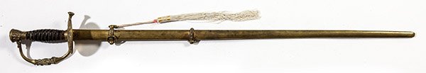 M1860 Staff Officers Sword: With 30" double edged steel blade with etched patriotic symbols, single piece cast brass guard/knuckle bow with spread winged, shield breasted eagle and other motifs, brass pommel with eagles, brown l