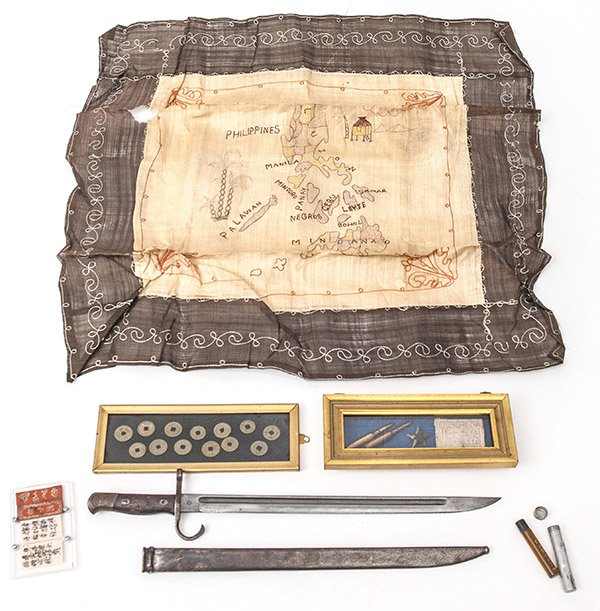 WWII Archive of USMC Corpl. Edwin Hurdle: Lot of 23 items including Japanese bayonet with scabbard, 13 brass coins, Japanese Army brass cap badge, two 7.7mm Japanese rifle bullets, one silk and three paper pieces with Japanese inscriptions, m