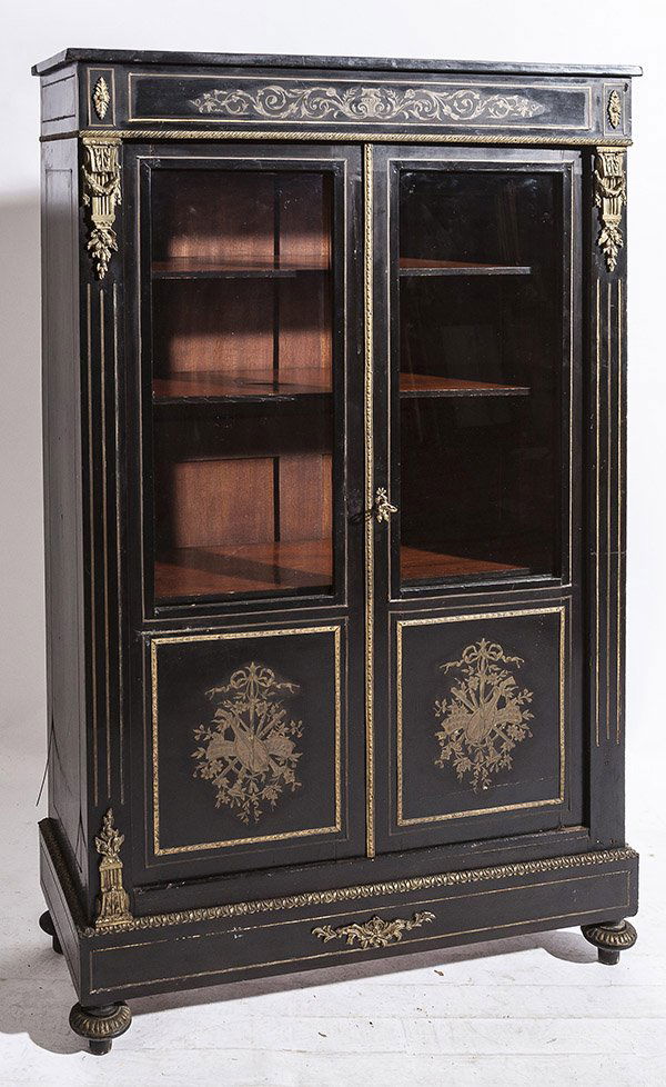 Bouille Inlaid Ebonized Cabinet: In Louis XVI style with ormalu trim and two 3/4 glass doors inlaid with musical instruments on lower doors, tuned feet with ormalu trim, solid ends. 13 3/4" x 35" x 61" high.