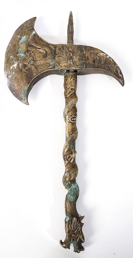 Ornamental Tibetan/Chinese Bronze Dragon Axe: Cast bronze with 7 1/2" wide curved blade, with rear hooked spike and top spike with handle having a spiraling dragon with dragon head terminal. 10" x 19" long.