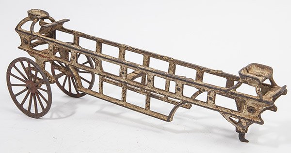 CAST IRON FIRE LADDER WAGON: lacking team, driver and ladders in original white and red painted finish, 4 x 16 x 6" high.