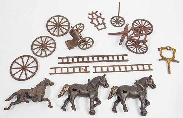 CAST IRON HORSE DRAWN VEHICLE PARTS: lot of 13 including ladders, ladder support, sulky, 3 wheels and 3 horses.