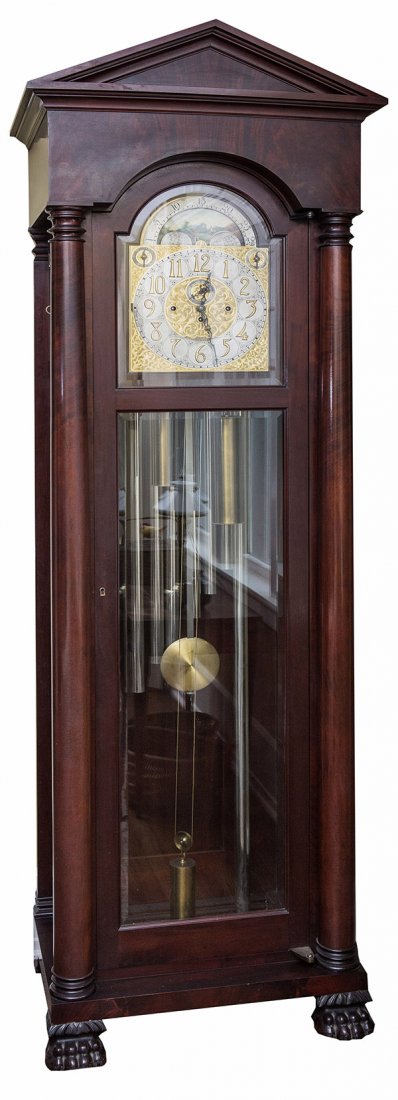 Bawo & Dotter Tall Case Clock: With brass arch top dial with raised Arabic numerals phase of the moon above, weight driven time, strike and chiming movement with nine tubes, playing Westminster chimes, original pendulum, dial marke