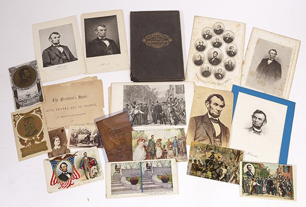 Lot of Lincoln Memorabilia: Lot of 20, including two cdv's one of Mrs. Lincoln and one of engraving of death bed scene, seven different post cards, one stereo card, one sheet music, seven different engravings, one copper relief 
