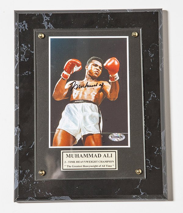 Autographed Muhammad Ali Photograph: Color 3 3/4 x 5 inch under plex mount, 7 x 9 inch.