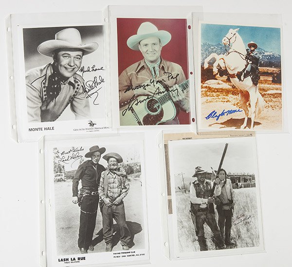 Five Autographed Photos of Western Movie Stars: All circa 8 x 10 inches, including American Indian actor Iron Eye Cody, plus Clayton Moore on silver, color, plus Lash La Rue, plus Monte Hale, and Gene Autry, color.