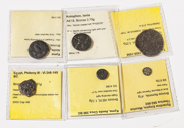5 Ancient & 1 Medeival Coins: Includes: Kyme Aiolis, 3rd Century BC Bronze, AE17; Byzantine Empire, Maurice Tiberius 582-602 Bronze Nummis;Egypt Ptolemy Vi 246-145 BC Bronze AE 15;Kolophon, Ionia AE18 Bronze;Aeolis Circa 350 BC Br