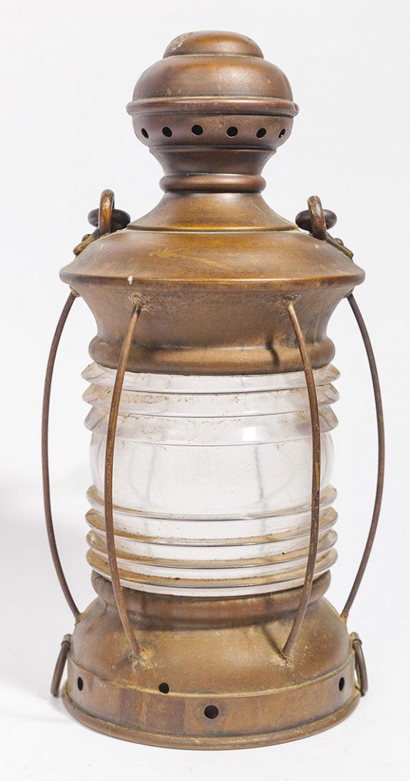 Early Brass Ships Lanterns: with attached brass label reading "M'F'G'D By Perkind Marine Lamp Corprn Brookyn-New York" with ribbed clear glass globe and heavy swing bale handle, 7" diameter x 15 1/2" high, all in nice old brown