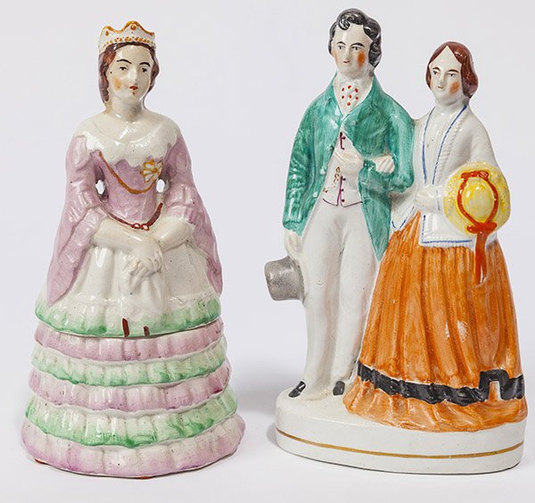 Two Staffordshire Figures: including a dresser box of Queen Victoria by P.D.G. Pugh in original polychrome painted glaze, 7" high and husband and wife7 1/4" high, both mid 19th century.