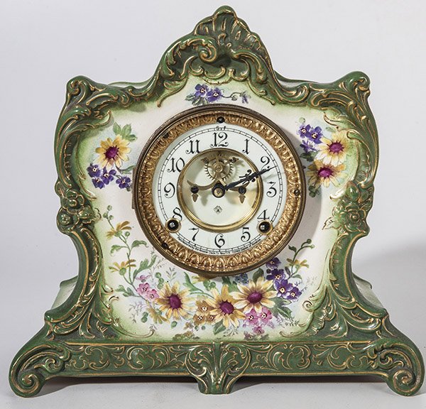 Ansonia La Lome Porcelain Clock: With open escapement enameled porcelain dial with Gothic Arabic numerals, marked with Ansonia trade mark of "A" in square and diamond and "Manufactured By The Ansonia Clock Co., New York, U.S.A. with 