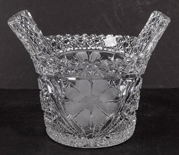 American Brillian Period Cut Glass Ice Tub: with cut daisies on sides, hobstars under handles and star border with nails head, hob star base, 7" diameter x 5 1/2" high.
